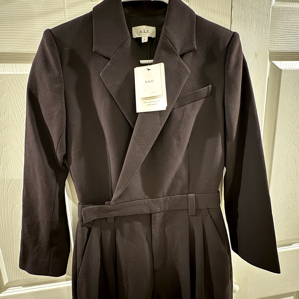A.L.C Black tailored jumpsuit with back cutout detail and side pockets.
